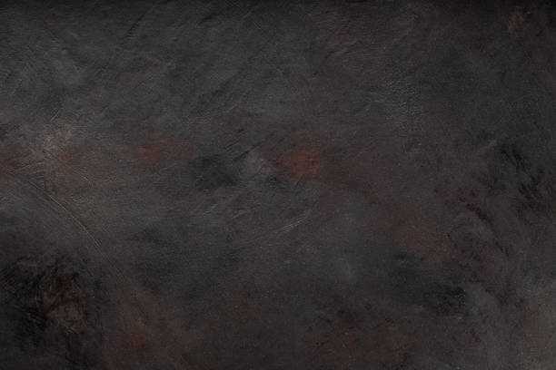 istock Vintage Grunge Backdrop: Weathered Dark Surface with Textured Details 1711704845