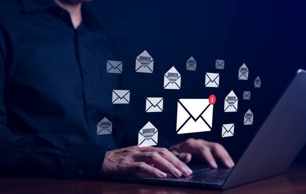 istock Businessman checking email and sending email on computer. New e-mail notification concept for business communication and digital marketing. Inbox, receiving electronic message alert, spam mail check, 1711718491