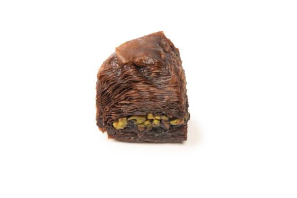 istock Turkish chocolate baklava isolated on white background. 1711754486
