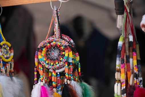 A dream catchers with feathers on it being sold at Toronto's City Hall's Nathan Phillips Square for truth and Reconciliation day