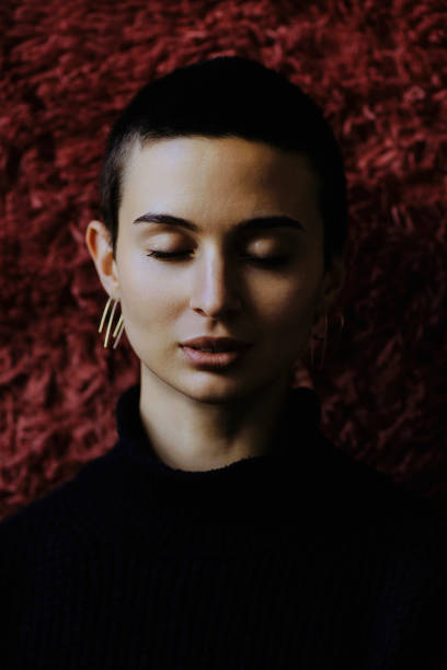 istock Young woman with eyes closed 1711768438