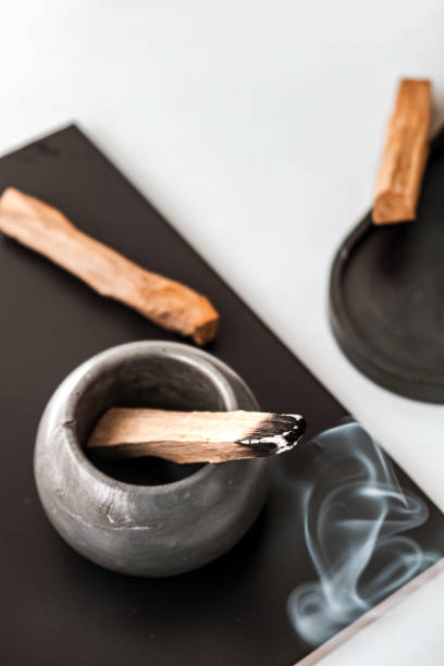 istock Palo Santo sticks on a light background.Aromatherapy religious rituals meditation.Wellness with aromatherapy and the occult.Healing incense Palo Santo.Organic incense of the holy ritual tree.Ibiokai 1711794131