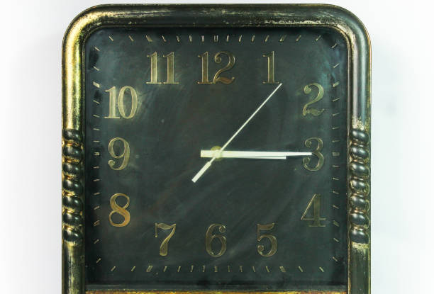 istock antique gold square wall clock. on white background, retro look concept 1711802492