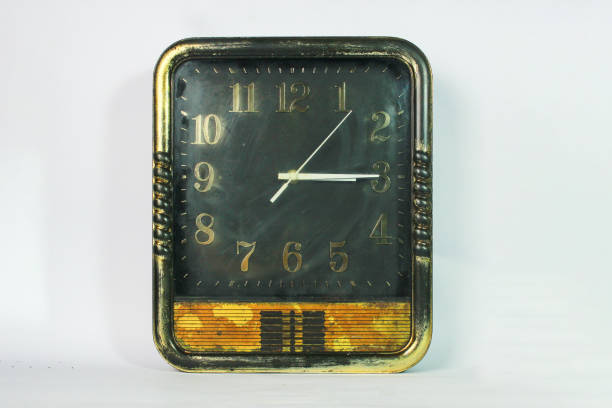 istock antique gold square wall clock. on white background, retro look concept 1711802854