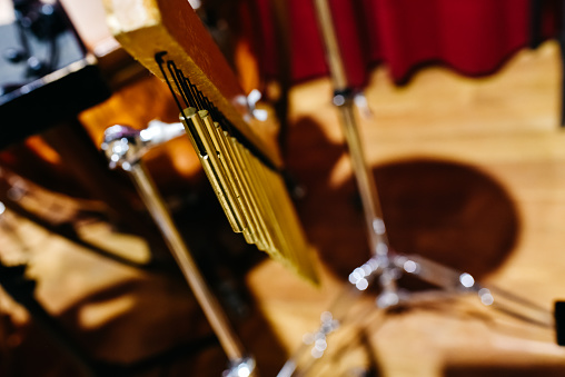 Musical detail of a golden Windchimes.
