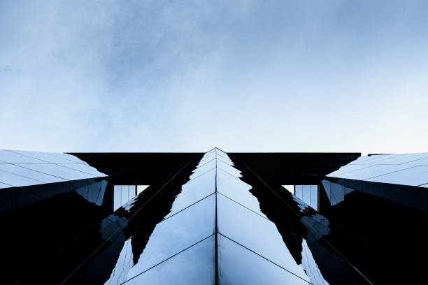 istock Glazed building with reflections where the working middle class aspires to buy residences as executives. 1711819588