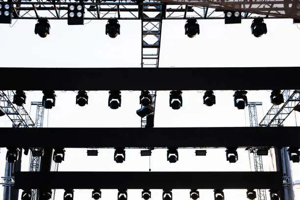Structure to support the spotlights of a stage before a musical concert outdoors.