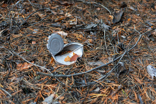 istock Old discarded open tin can with the lid. 1711830446