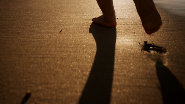 Child walking on beach