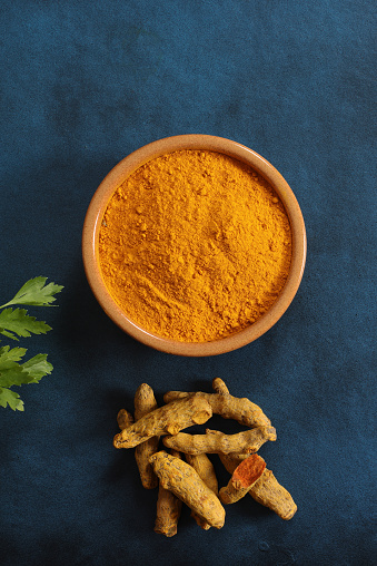Turmeric roots ground to powder