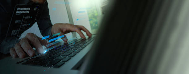 istock Analyst computer working with information database to analysis marketing sale data. Business project investment program strategy planning and development  schedule operating finance and investment. 1711954081