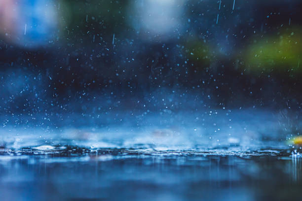 istock Rainy weather background. Rain drops. Puddle 1712001670