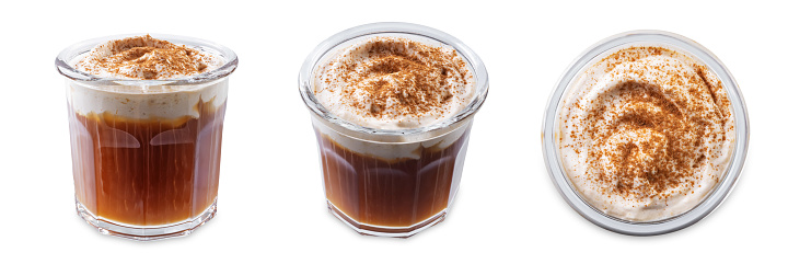 Pumpkin spice cold Brew in a glass on a white isolated background. toning
