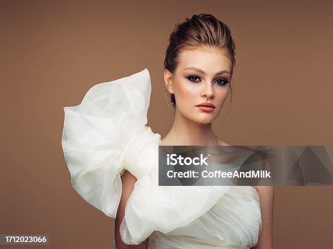 istock Beautiful blond woman as a bride 1712023066