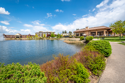 The small lake in the work, live and play community of Riverstone in the downtown district of Coeur d'Alene, Idaho, in the Idaho panhandle. Riverstone is an open-air lifestyle shopping destination with condominiums, hotels, shopping, restaurants and a movie theater.  Therre is also a 10 acre park with water fountain.
