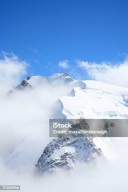 Scenic View Of Mountain Top Full Of Snow Stock Photo - Download Image Now - Mont Blanc, Cloud - Sky, European Alps