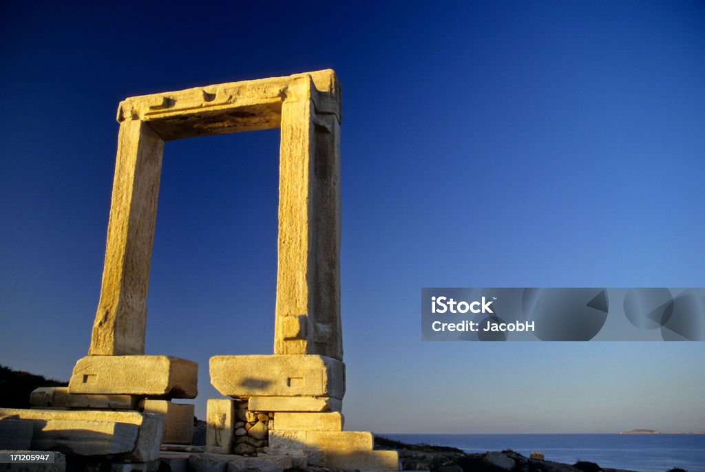 Temple of Apollo, Naxos Temple of Apollo Islet of Paltia Naxos Town during sunriseAll images from Greece Aegean Sea Stock Photo