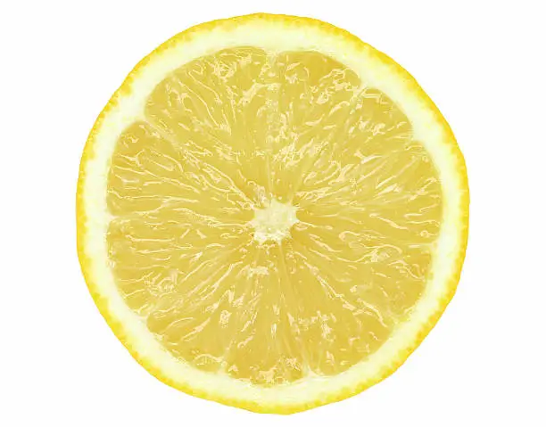"Closeup of half a lemon, isolated on white."