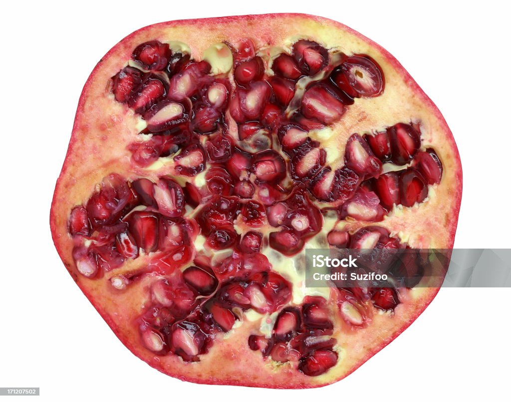 pomegranate "Closeup of half of a pomegranate, isolated on white." Fruit Stock Photo