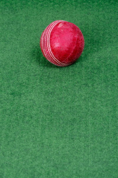 istock Old Red Leather Cricket Ball On Artificial Grass 171208678