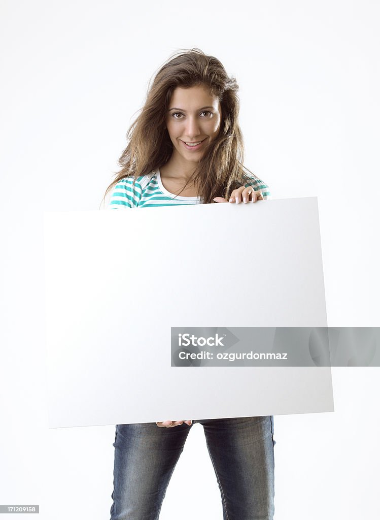 Jovem feliz, segurando um cartaz branco - Foto de stock de 20 Anos royalty-free