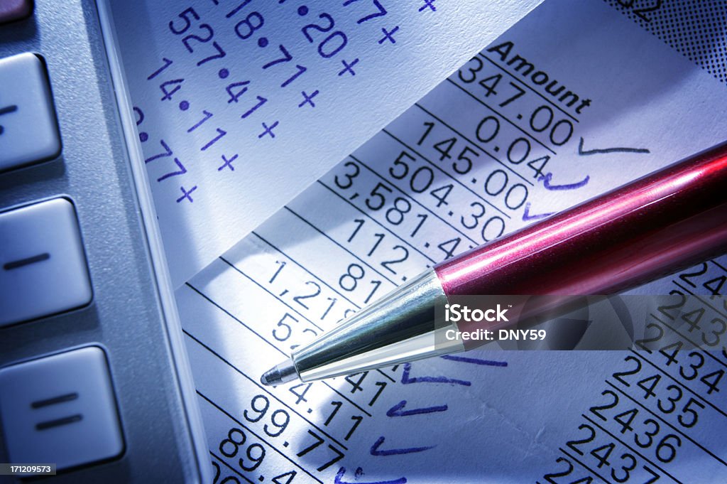 Balancing Checkbook "Close up of checkbook,calculator, and pen.To see more of my financial images click on the link below:" Financial Bill Stock Photo