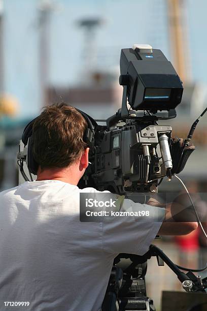 Television Camera Man Operating Equipment Stock Photo - Download Image Now - Adult, Broadcasting, Camera - Photographic Equipment