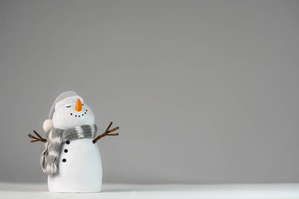 Winter holiday card with snowman. For Christmas holidays greeting cards, invitations, marketing, advertising,, invitations, storytelling. Single snowman enjoying snow, with copy space. Not AI