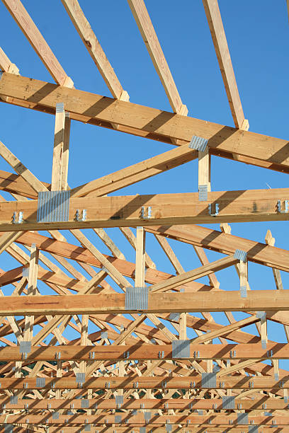 istock New Home Trusses and Brilliant Blue Sky 171211842