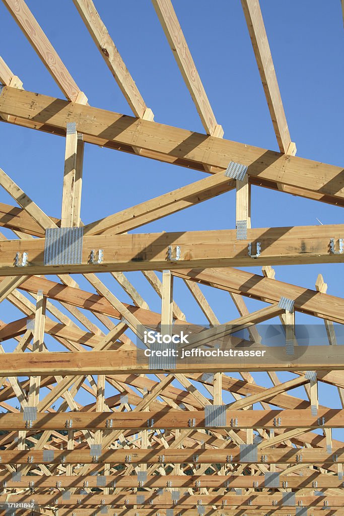 New Home Trusses and Brilliant Blue Sky New construction. Trusses with a blue sky. Architecture Stock Photo
