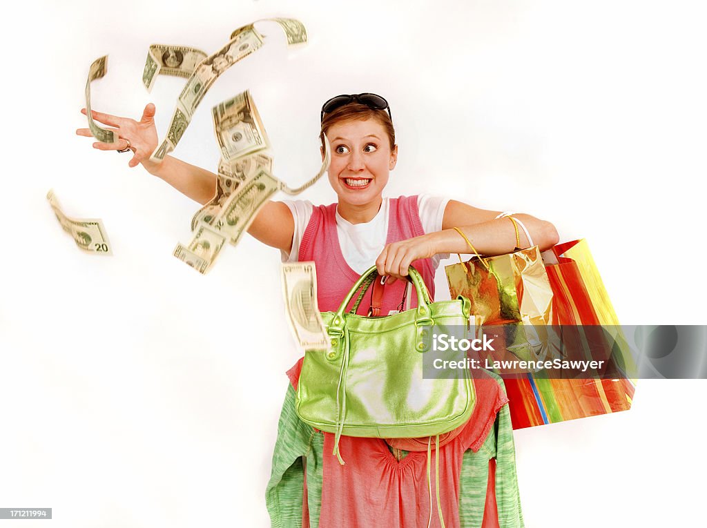 Zakupy Girl Podrzucając pieniądze - Zbiór zdjęć royalty-free (Zakupy)