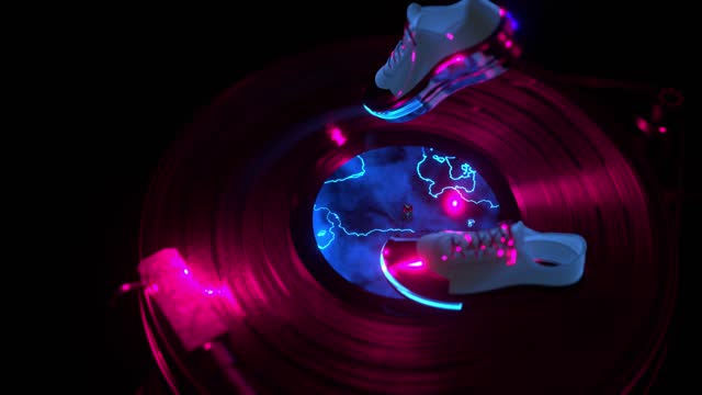 dancing abstract shoes, with neon light, on a vinyl record player, beautiful background for music