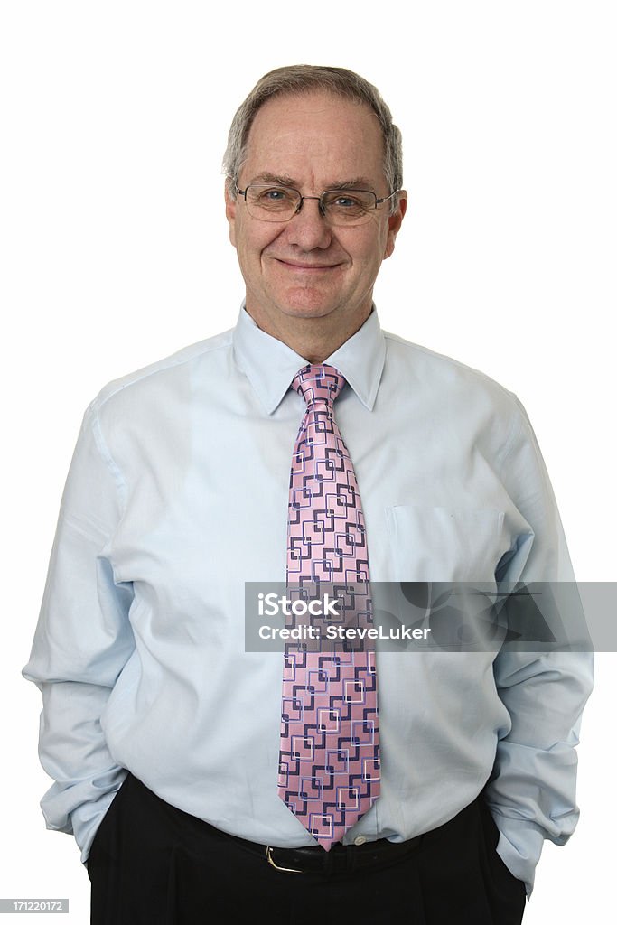 Hands In Pockets "Smiling man in business attire, with hands in pockets." Active Seniors Stock Photo