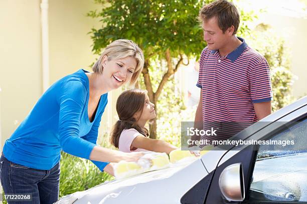 Family Washing Car Together Stock Photo - Download Image Now - 30-39 Years, 8-9 Years, Adult