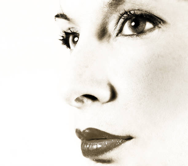 istock Close-up of woman's face (sepia tone) 171220507