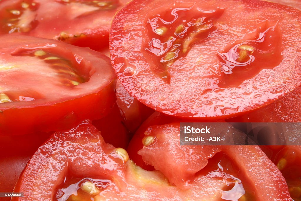 tomatos fette - Foto stock royalty-free di Alimentazione sana