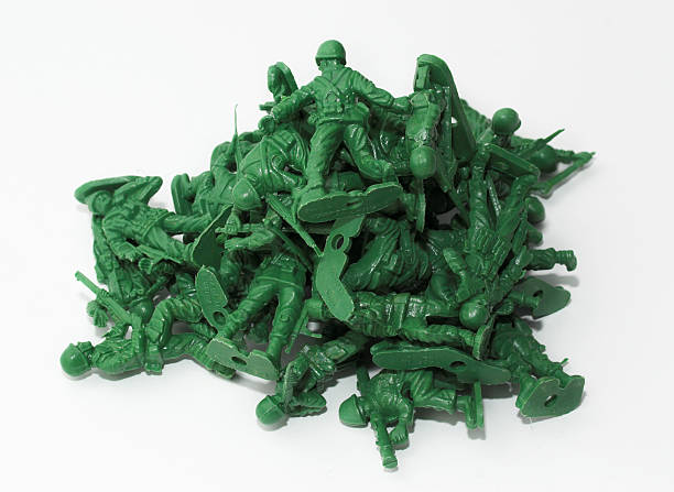 Wild bunch Pile of toy soldiers. toy soldier stock pictures, royalty-free photos & images