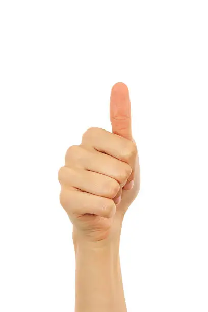 Thumb up gesture against white background.