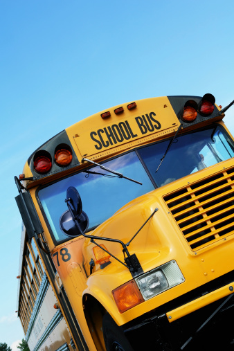 It's back to school time with this front of a bright yellow bus!