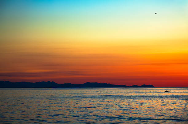 Sky over sea at dusk. Photo taken on coast of Sicily.