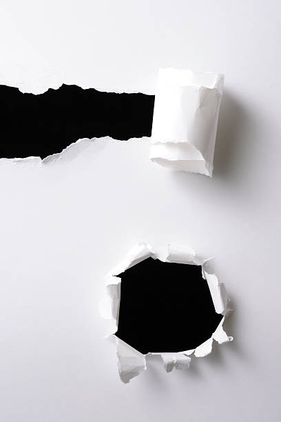 istock Isolated shot of two different holes on black background 171221208