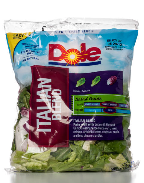 Dole Italian Blend Salad "Miami, USA - May 20, 2012: Dole Italian Blend Salad 10 OZ bag. Dole brand is owned by Dole Food Company, Inc." dole stock pictures, royalty-free photos & images