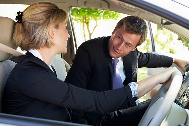 istock Two Business Colleagues Car Pooling Journey Into Work 171221517