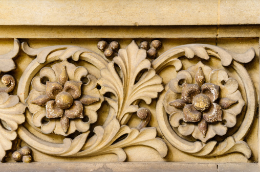 Antique floral carving on tomb stone.