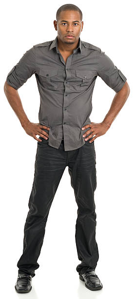 istock Young Man Standing With Arms Akimbo 171221909