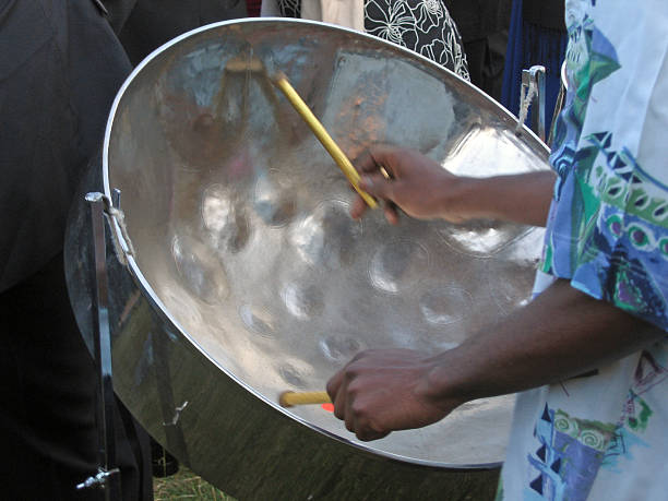 Steel Band A man playing a steel drum.Please click below for another picture from this series: steel drum stock pictures, royalty-free photos & images