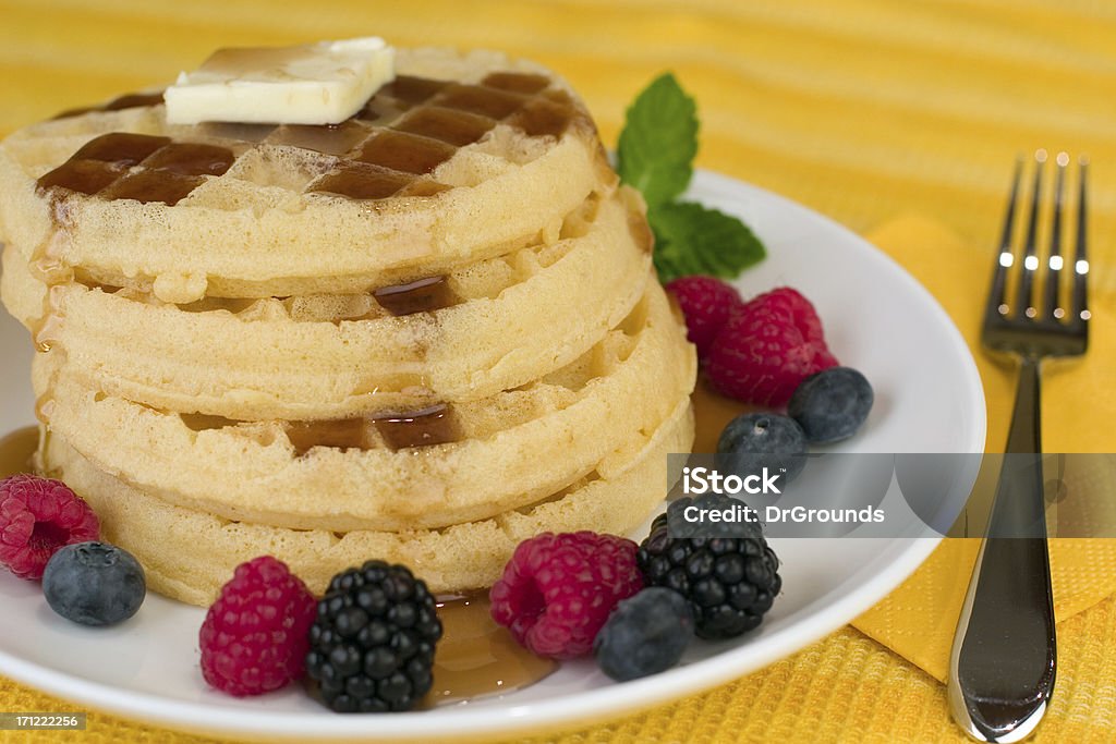 Waffles A close up pf waffles with berries. Belgian Culture Stock Photo