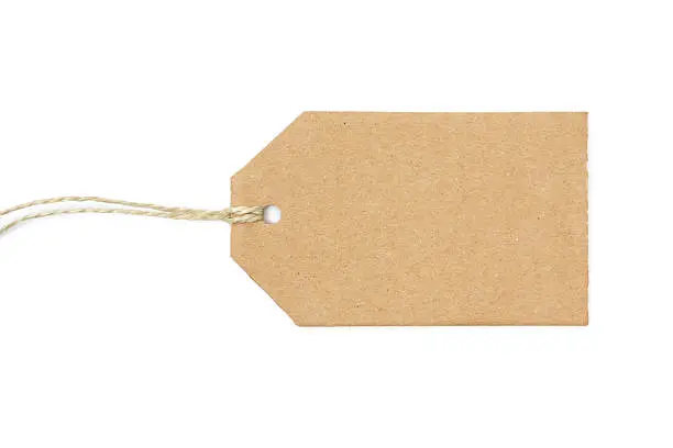 Blank brown paper tag on a string. Isolated on a white background.