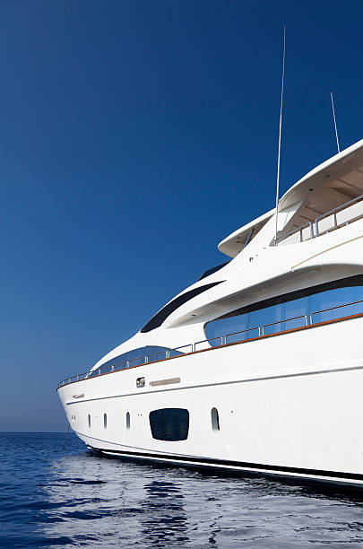 A large motor yacht under way out at sea, copy space