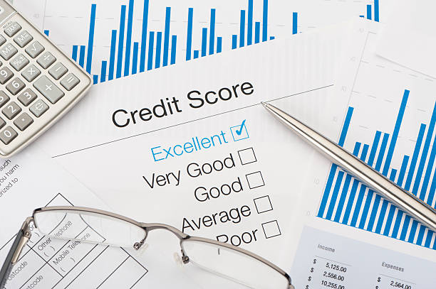 Excellent Credit Score Excellent Credit Score with pen and calculator credit score photos stock pictures, royalty-free photos & images
